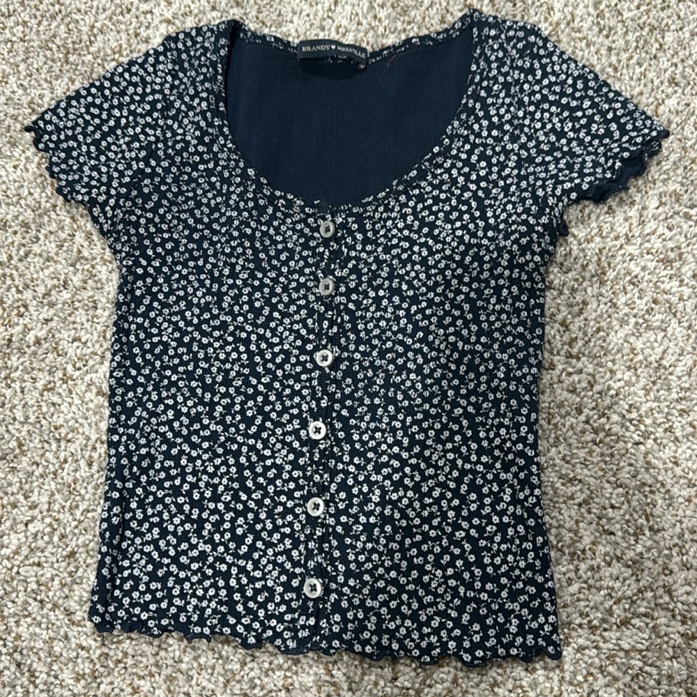 Brandy Melville, Blue and flowery top, super cute design, barely worn,
